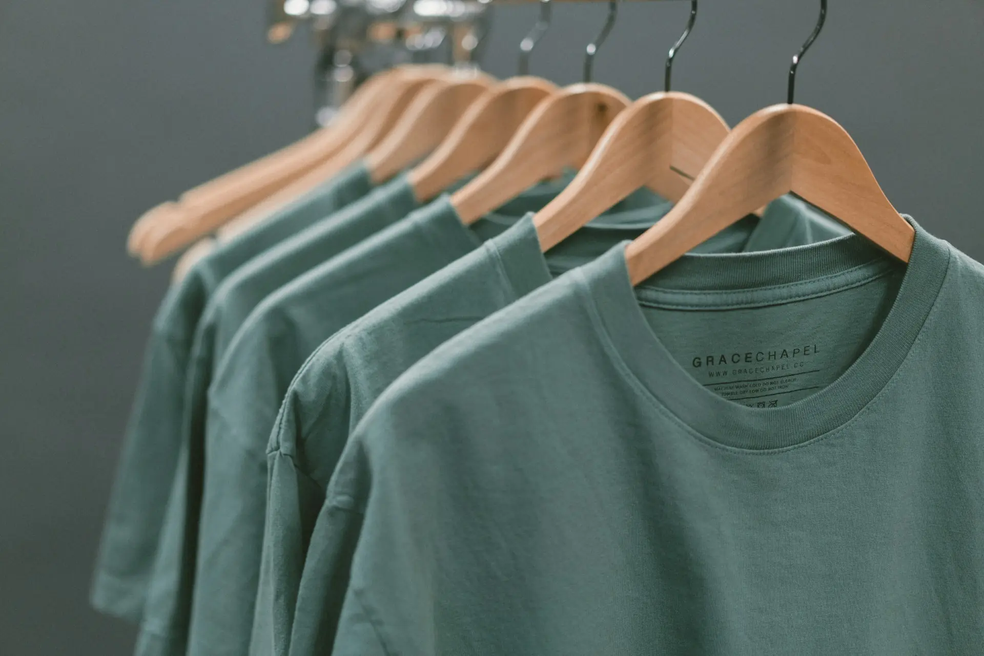 Knitted cotton T-Shirts on wooden hangers
