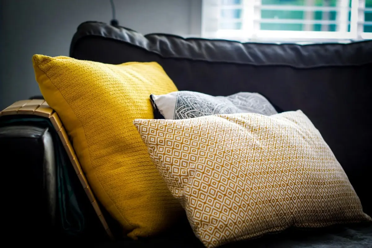 Cushions in assorted colours on a sofa